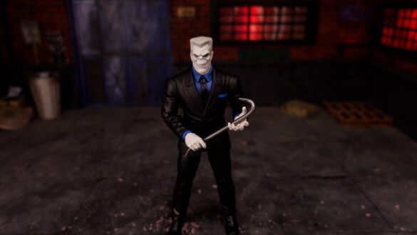 REVIEW TOMBSTONE – SPIDER-MAN.00_04_39_29.Imagen fija011 Tombstone de Marvel Legends sujetando la palanca gris con ambas manos frente al cuerpo.
