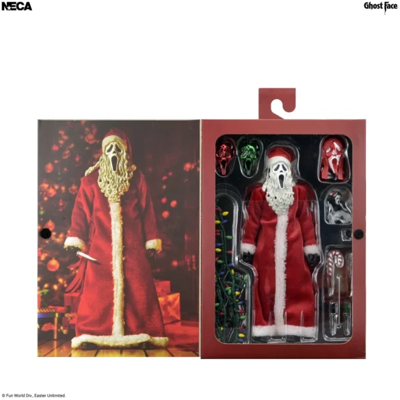 Caja abierta de Santa’s Slay Ghost Face de NECA con máscaras y accesorios.